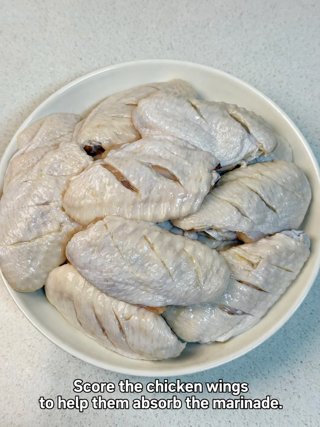 English-captioned photographs showing ingredient preparation and cooking for Pan-Fried Salt and Pepper Chicken Wings.