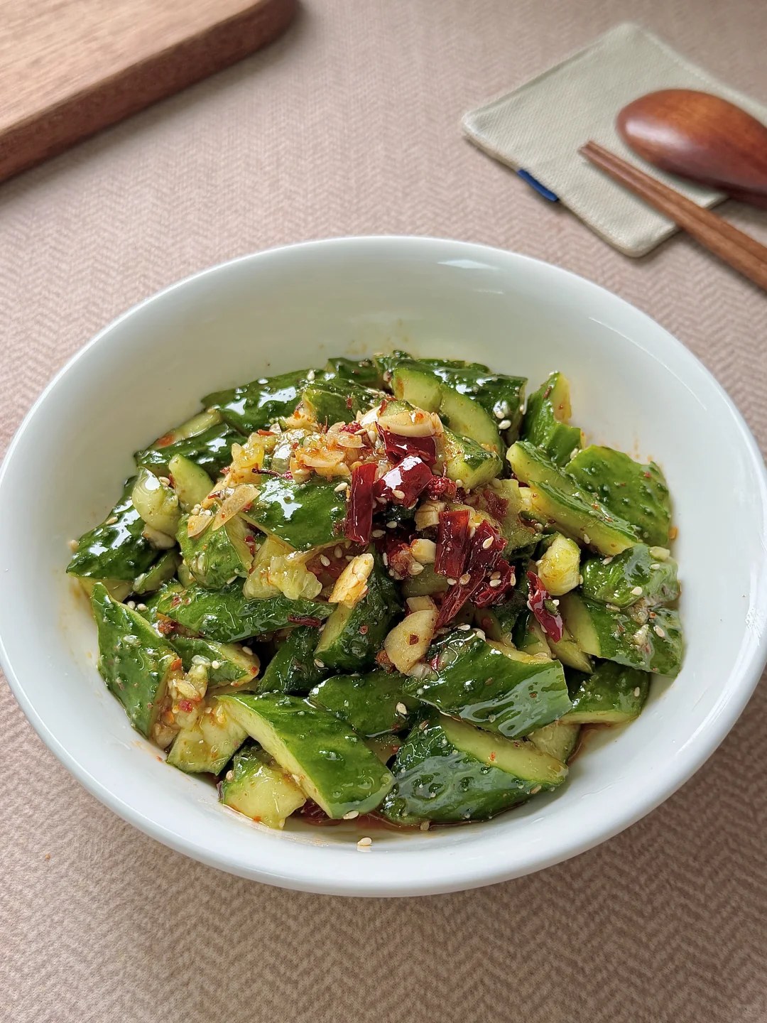 Green cucumber chunks with garlic and dried chiles.